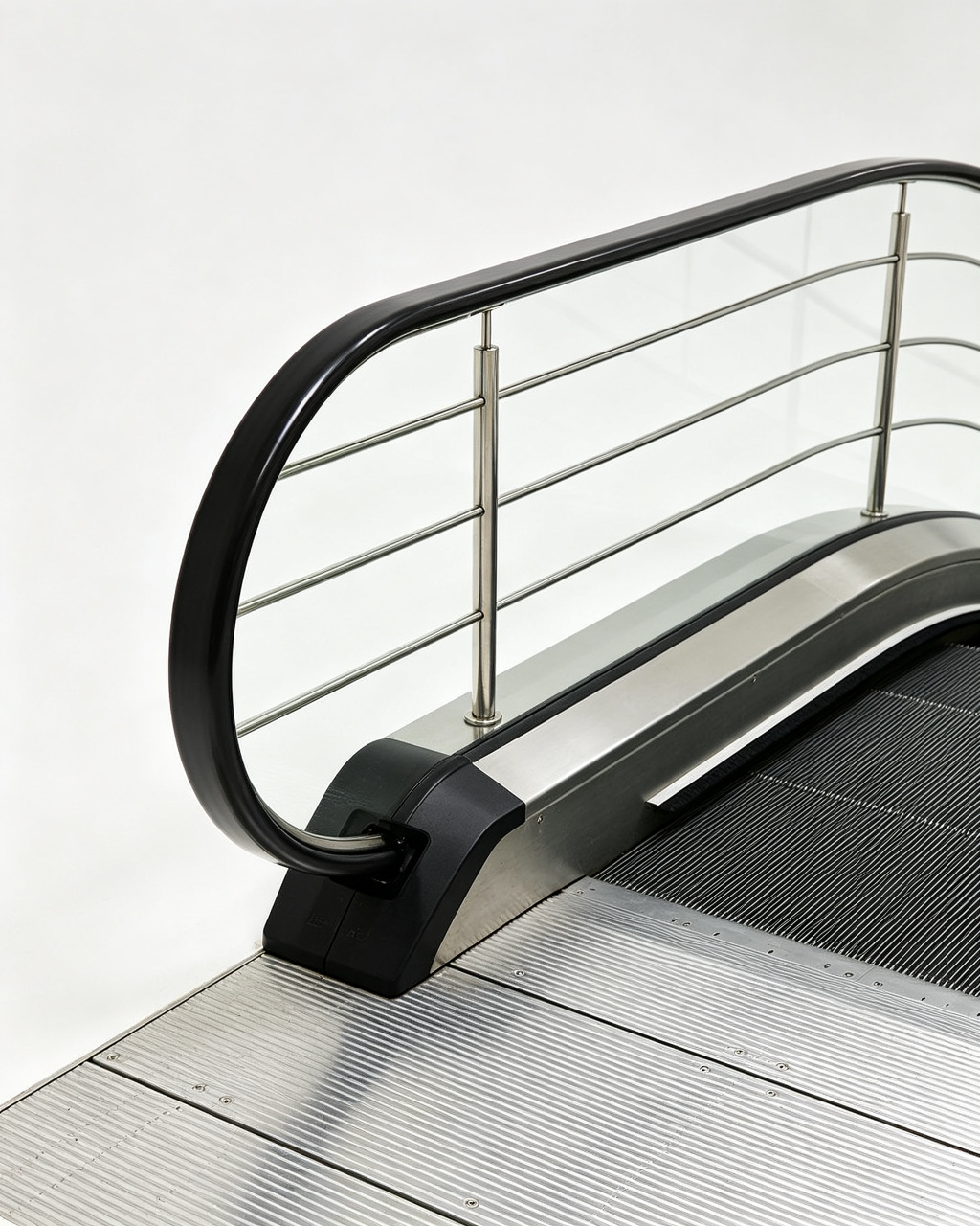 Moving walkway with stainless steel balustrade in a public venue